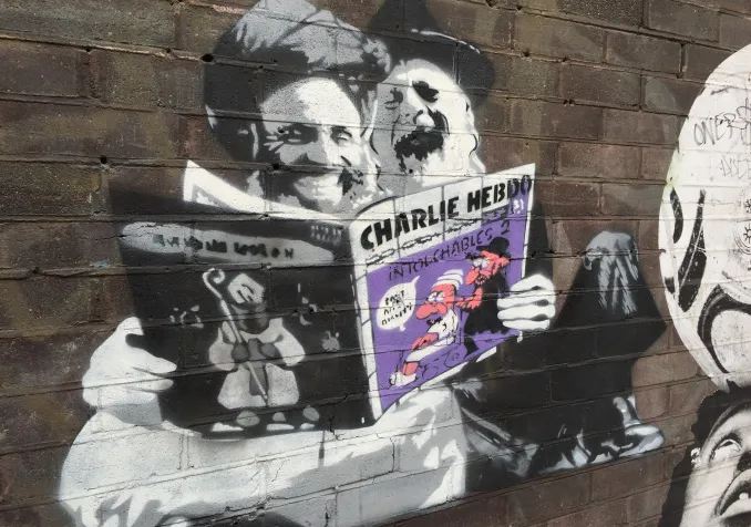 Un tag de rue évoquant les caricatures de "Charlie Hebdo" Flickr / Matt Brown