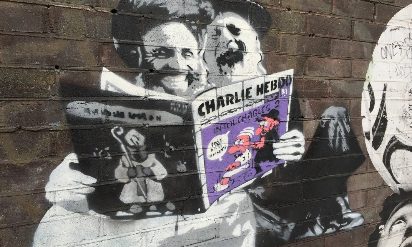 Un tag de rue évoquant les caricatures de "Charlie Hebdo" Flickr / Matt Brown