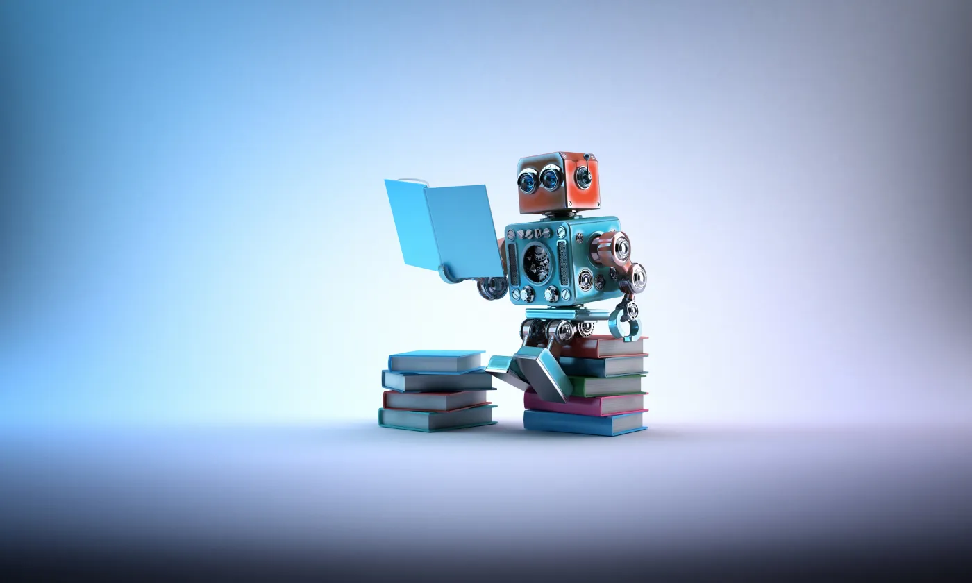 Un robot en pleine lecture. Un exemple de deep learning? ©iStock / Kirillm